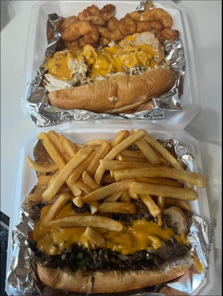 Loaded Philly cheesesteaks with fries and chicken